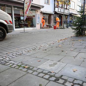 Saubermachen in der Fußgängerzone