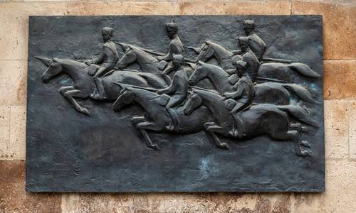 Foto eines Bronzerelief am Alten Zoll in Bonn