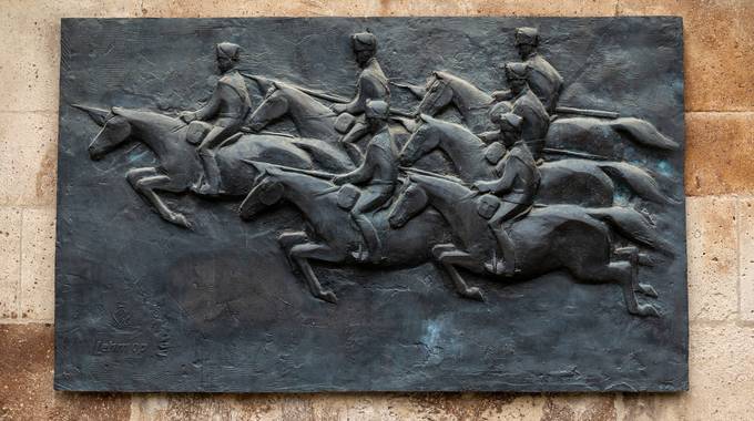 Foto eines Bronzerelief am Alten Zoll in Bonn